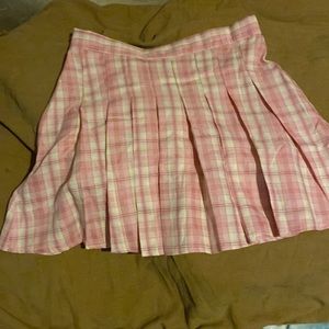Plaid pleated mini skirt. Unknown brand. Unknown size- probably a 6 or 8.